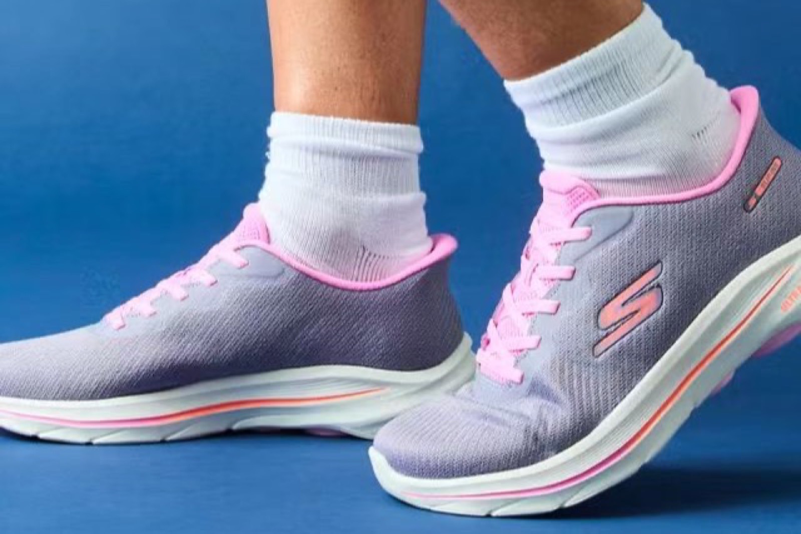 Skechers Go Walk style cushioned walking sneakers for long-standing comfort thumbnail